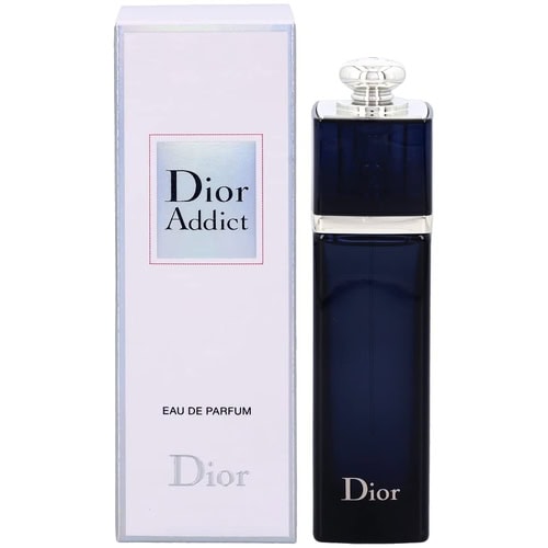Dior Addict perfume bottle with dark blue glass and clear cap, luxury fragrance for women.
